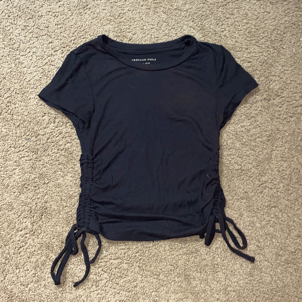 Black cropped t-shirt.